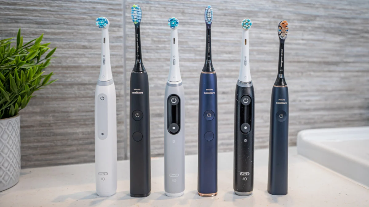 A-variety-of-Sonicare-and-Oral-B-brushes-stood-next-to-each-other
